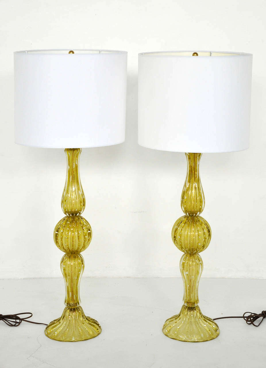 Murano lamps by Barovier & Toso.  Beautiful chartreuse glass with controlled bubbles.  Original solid brass adjustable height harps.  Shades not included.