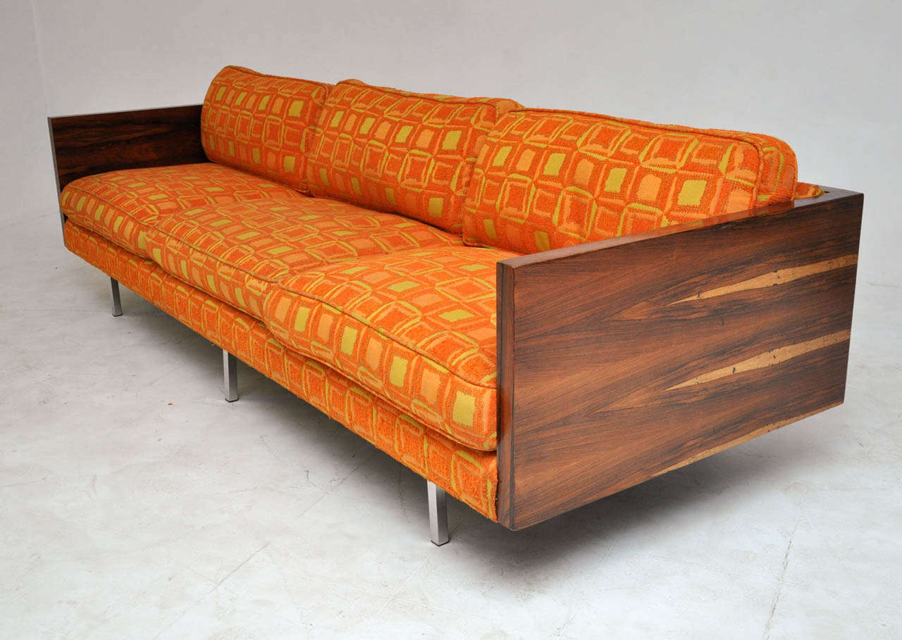 Rosewood case sofa by Milo Baughman.  Beautiful wood grain with vibrant geometric pattern fabric.