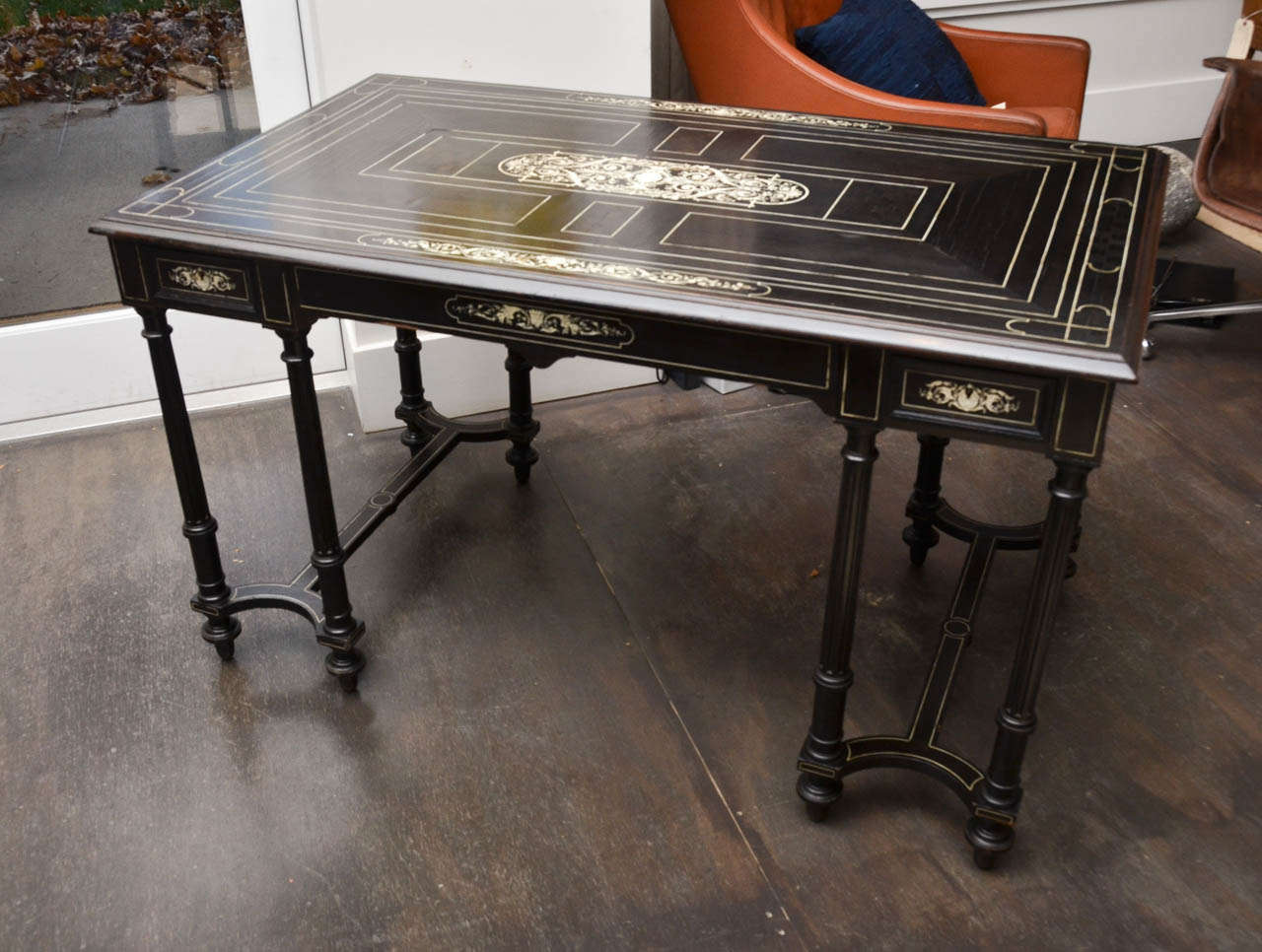 Beautiful ebonized Italian desk with delicate ivory inlay an parquet detailing. Two side drawers have locks with skeleton keys.