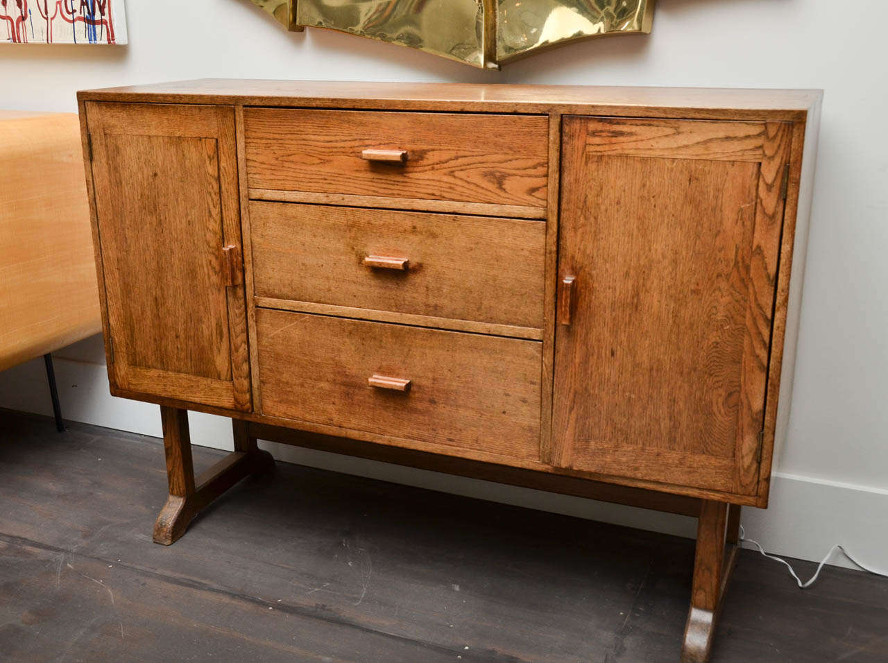 Beautiful high oak cabinet with three drawers and 2 cabinets.