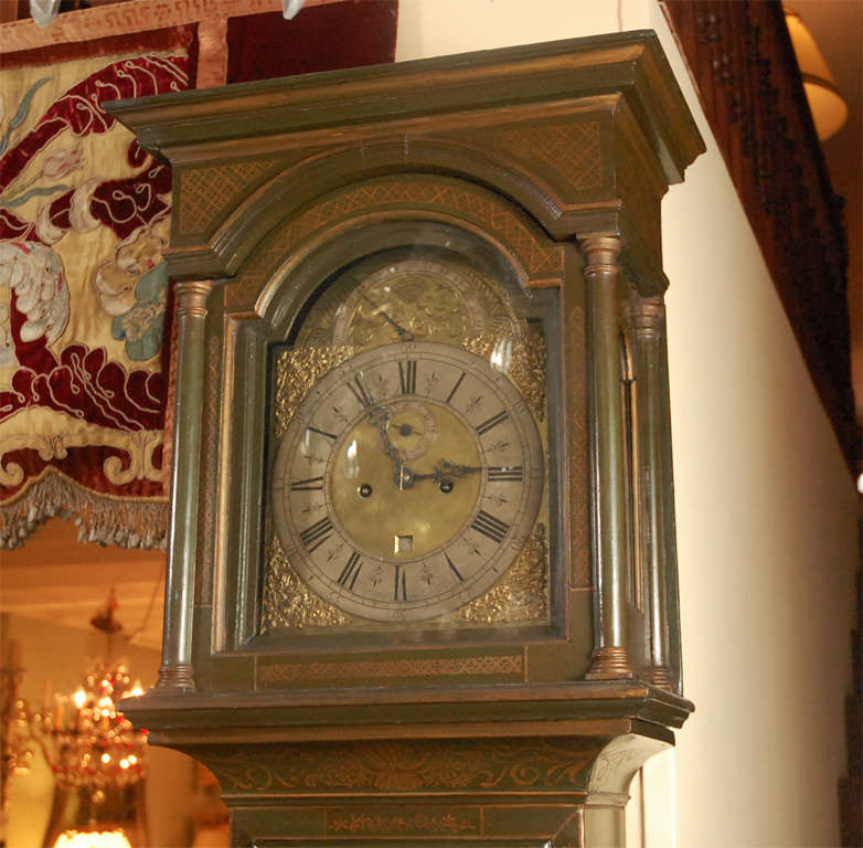 Rare 18th century Etherington tall case clock painted in rare olive green coloration with gold & bronze chinoiserie detailing.  The clock mechanics have been completely restored and the clock is in perfect working condition.