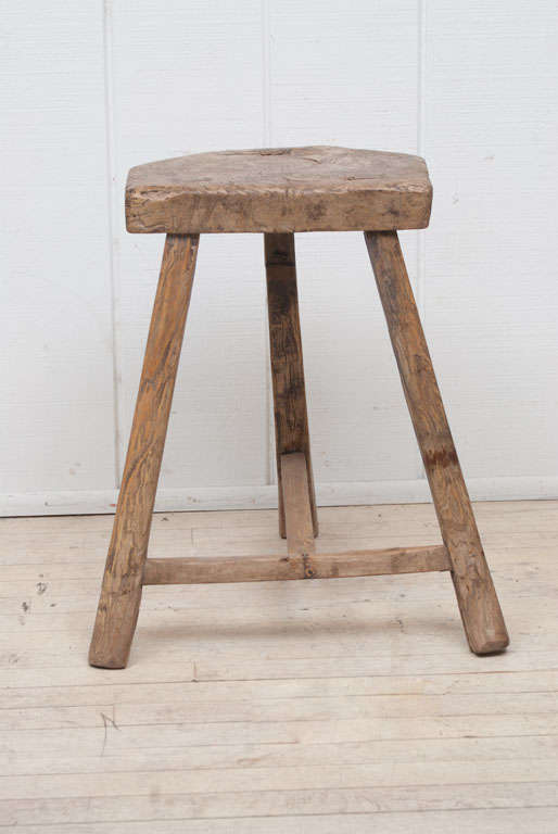 Chinese weathered wood,  rustic stool with unique tripod legs and mortice and tenon construction.