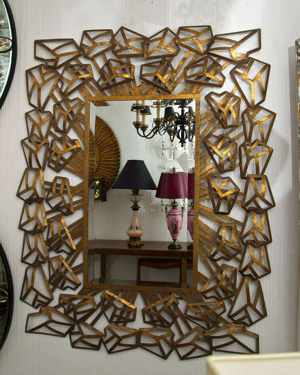 Pair of metal framed geometric mirrors
