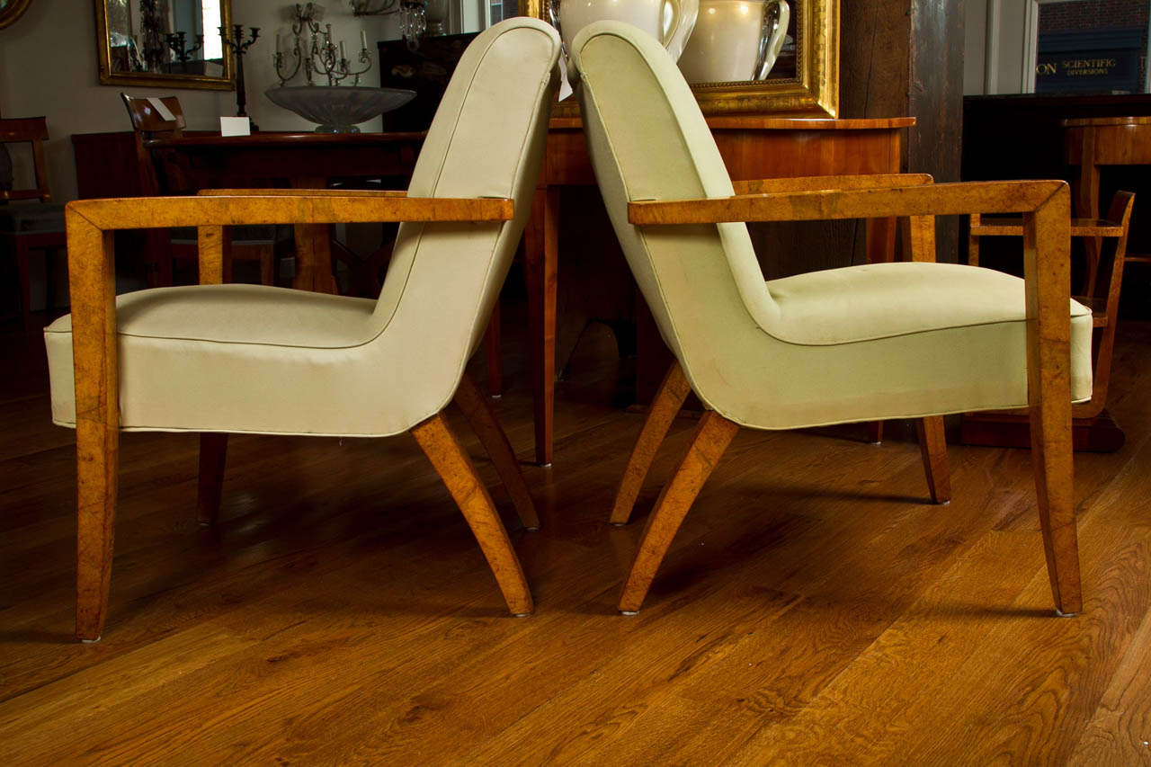 Stunning pair of Continental chairs with strong fluid lines comprised of  carpathian elm veneer, Italy  
generously sized and so comfortable