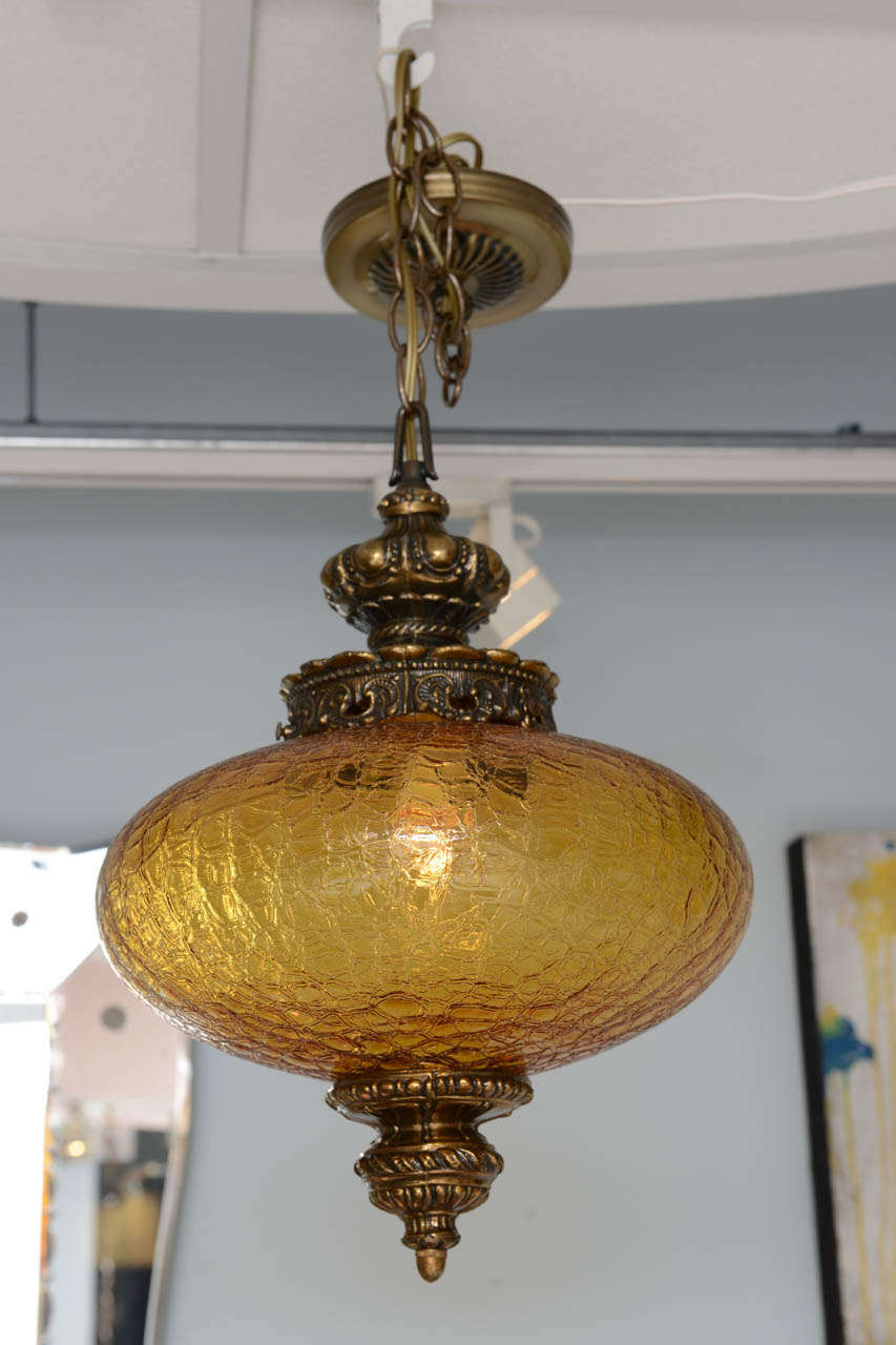 Antique amber ceiling pendant. Restored and rewired.
moving next door with no ability to display ceiling pendants