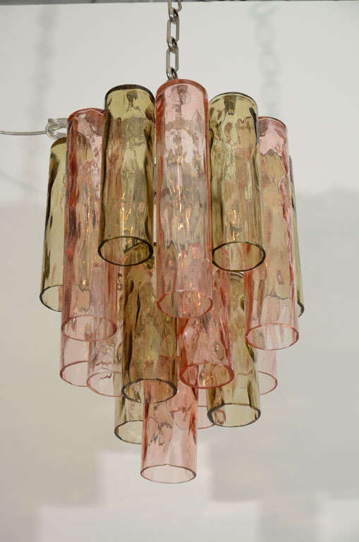 Beautiful fixture with 19 heavy-walled coral and bronze colored tubes.  This fixture has 6 edison sockets and emits great light.
*To see our entire inventory, go to www.donzella.com