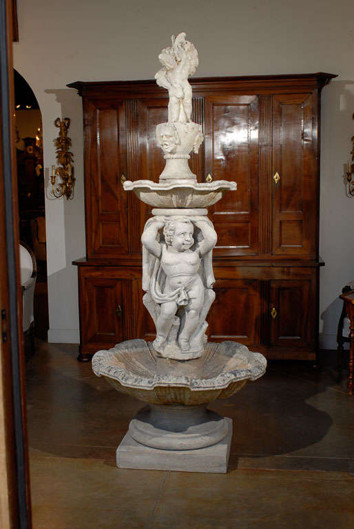 A large size Northern Italian carved stone fountain from the mid-19th century. This exquisite garden fountain was born in the 1850s in the city of Vicenza, in the Veneto region of Italy. One of the main elements present in Italian gardens since the