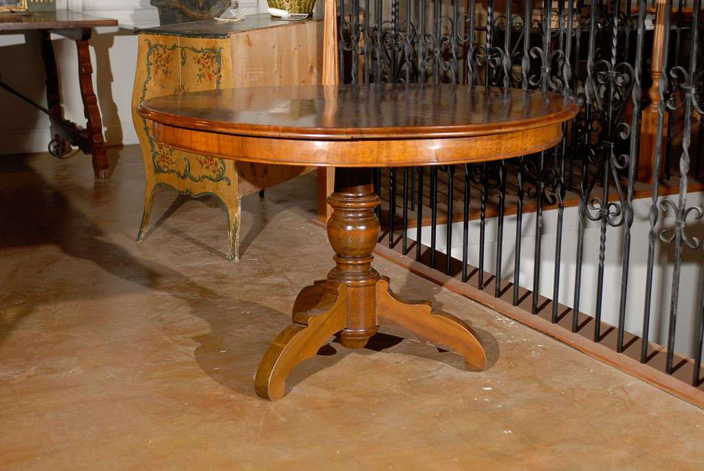 French Round Walnut Pedestal Table. Please Note This Item is an Antique and is One of a Kind. 