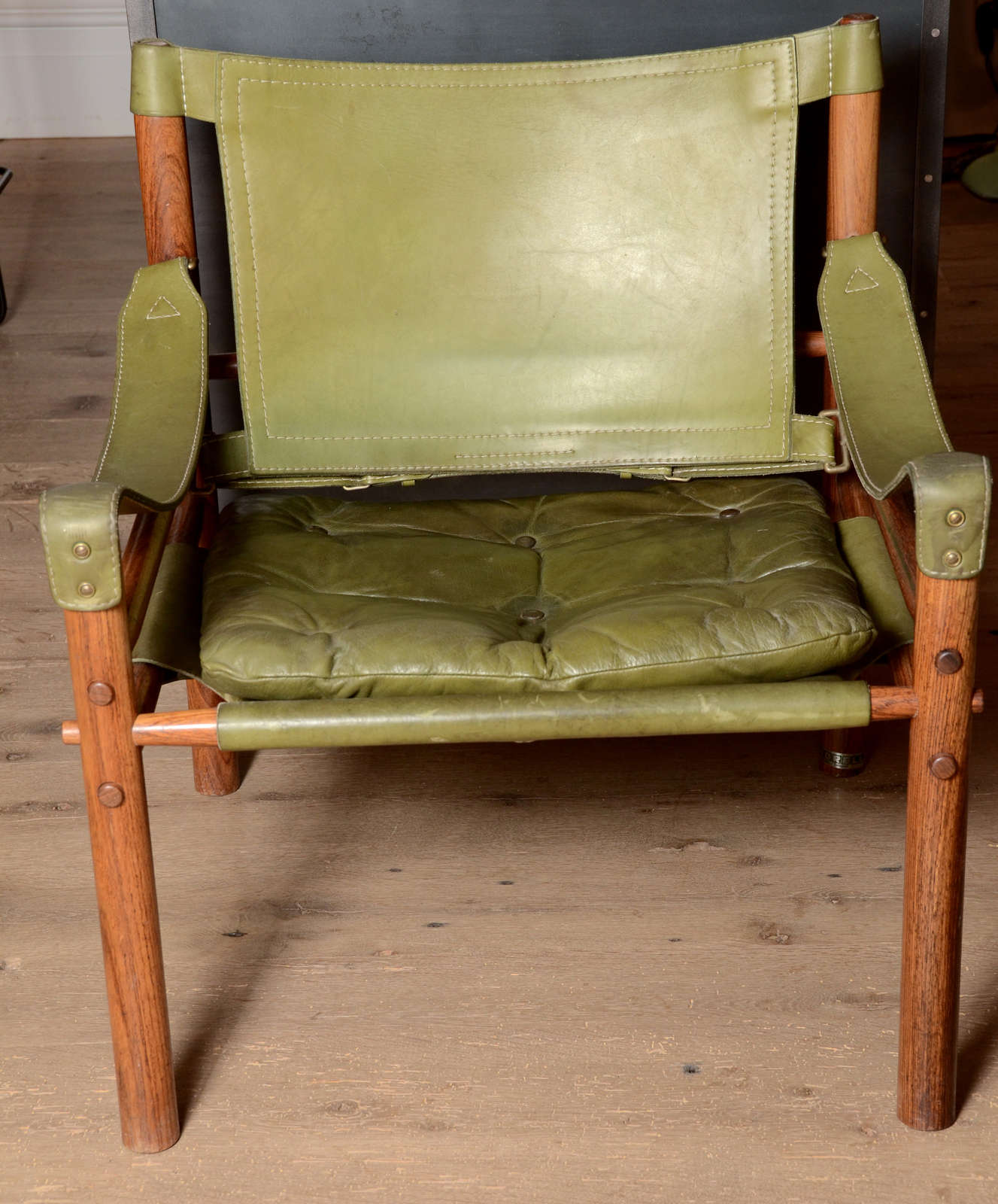 Stunning pair of Mid-Century Arne Norell Safari chairs in light olive green original leather