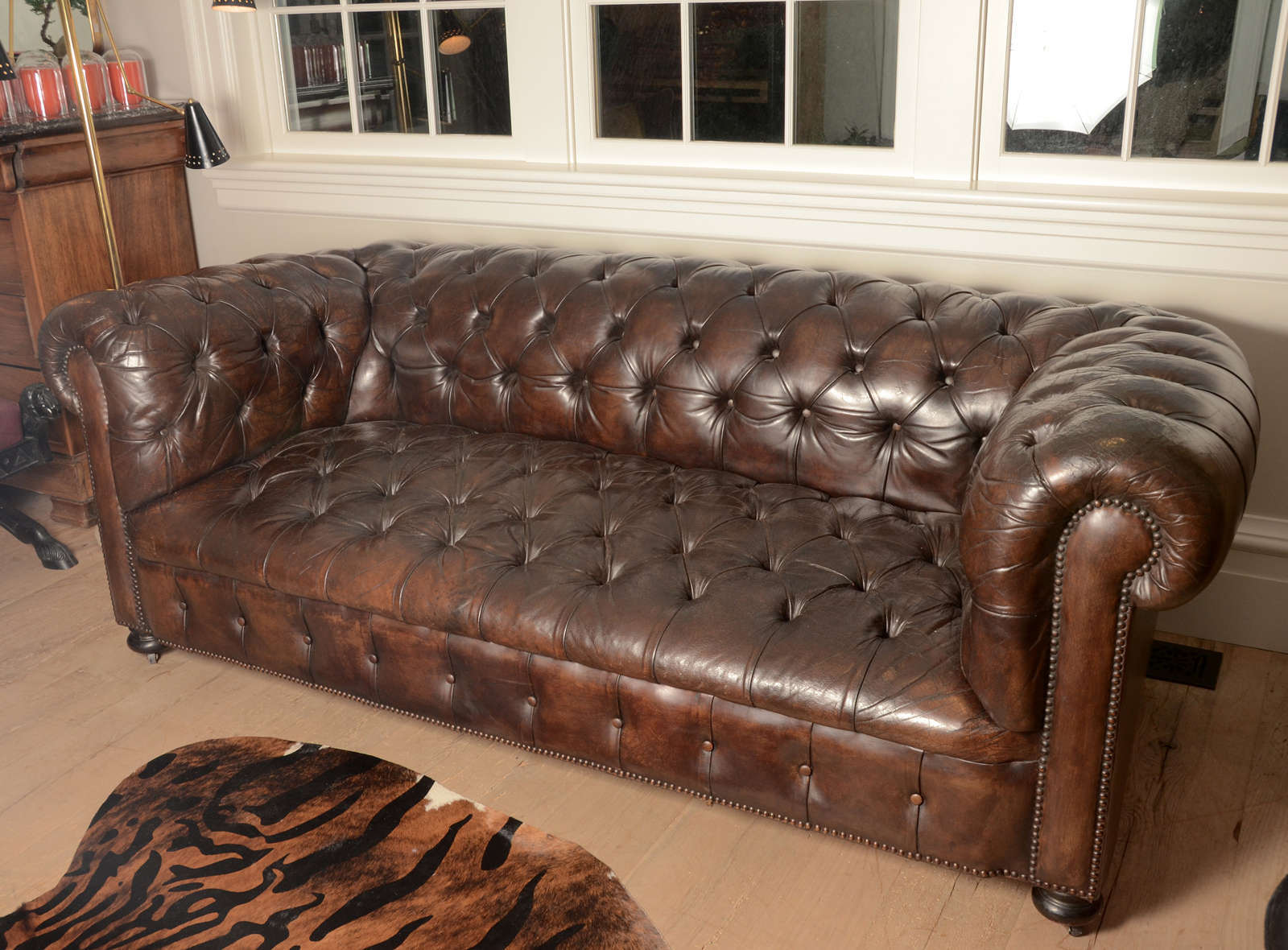 The first leather Chesterfield Sofa, with its distinctive deep buttoned, quilted leather upholstery and lower seat base, was commissioned by Philip Stanhope, 4th Earl of Chesterfield. It may have roots in 18th-century design, but when situated in a