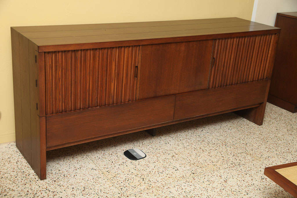 REDUCED FROM $8,500.....Absolutely brilliant sideboard credenza by Romweber, designed in the early 1950s by Harold Schwartz and executed in oak with fluting, inlays and wonderful detailing. Lavish storage with three doors opening to three felt lined