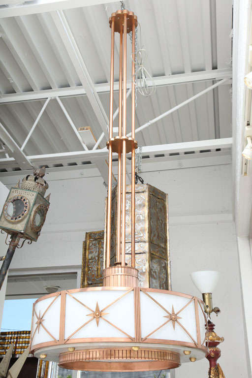 Monumental, neo- clasically inspired Art Deco chandelier with copper and aluminum accents.