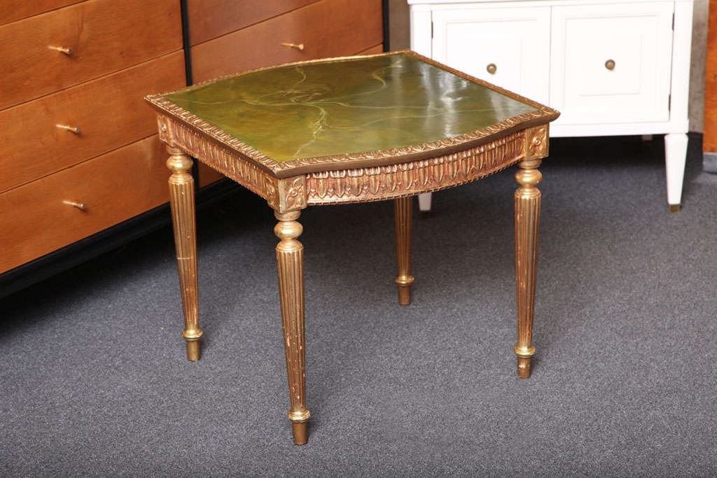 Delightful and quite nice 1960s Louis XVI style giltwood side table with a painted faux marble top. Very lovely 