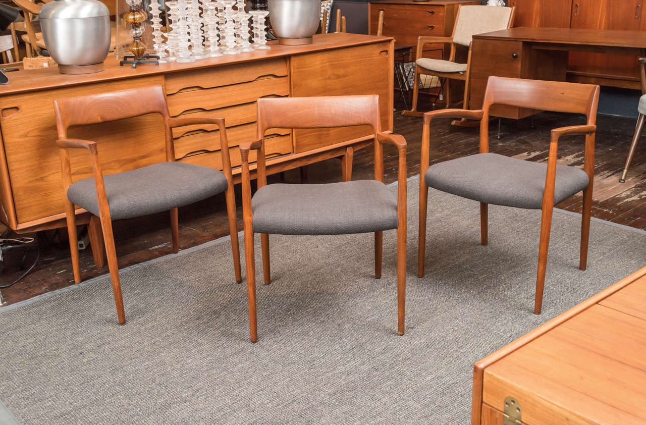 Set of six teak chairs with upholstered seat.

Measures: H: 30 1/4