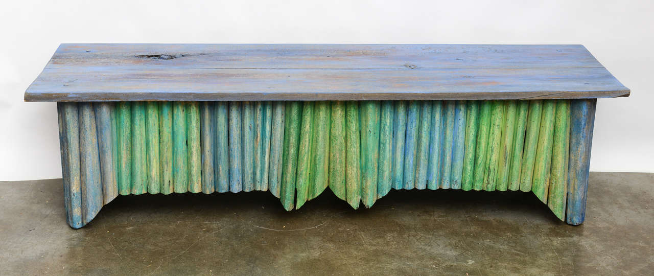 Wonderful pair of painted island benches made from palm fronds.