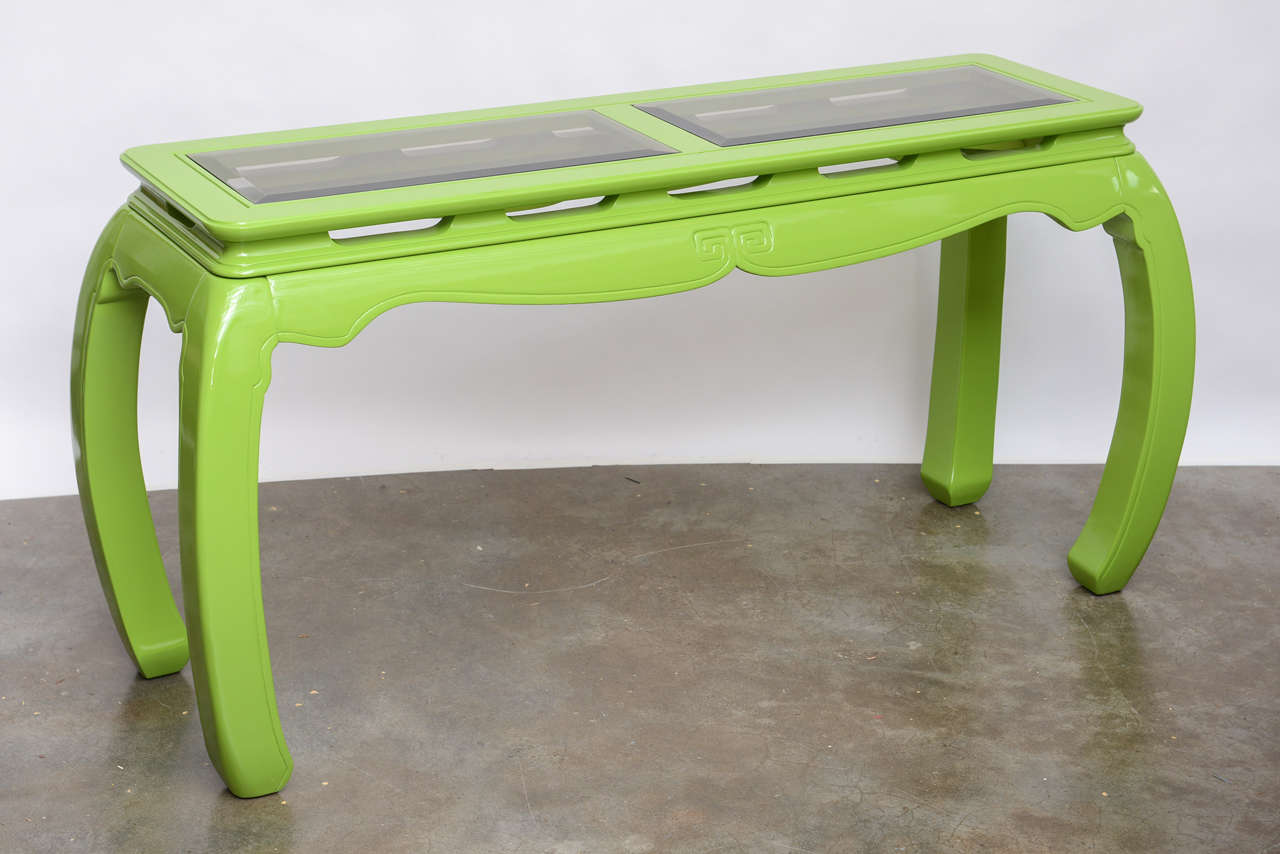 Fabulous lime green lacquered console with Asian design.