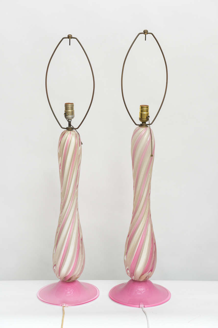 Striking pair of pink and white swirl Murano lamps. Attributed to Barovier.