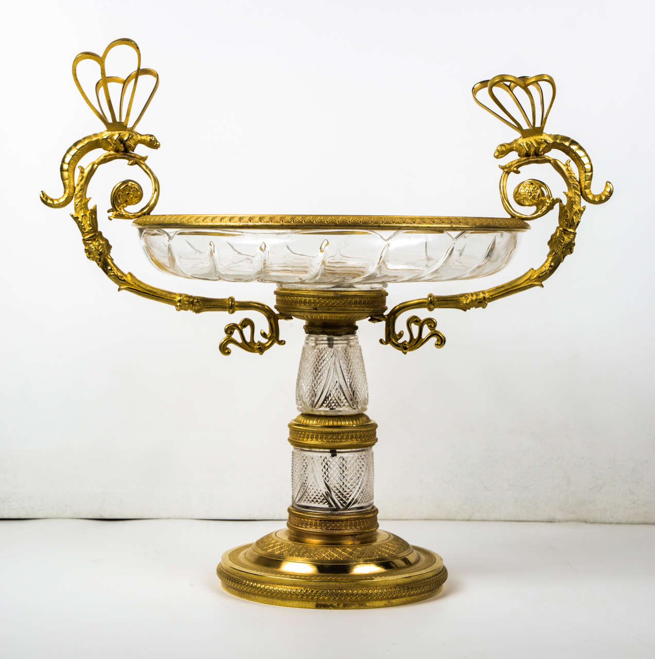exquisite crystal and gilded bronze center of table.
Handles  are surmounted by two dragonflies.