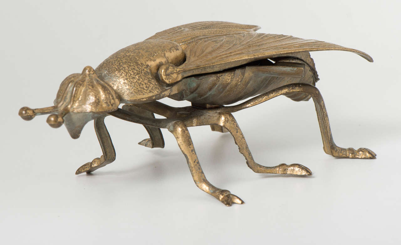A gilt metal ashtray in the shape of a bee,
Italy, circa 1970.