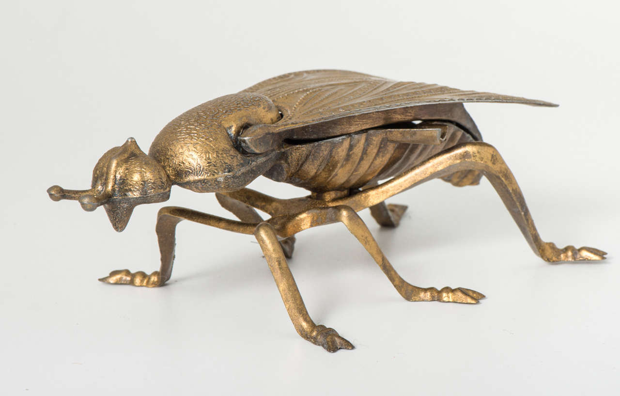 A gilt metal ashtray in the shape of a bee.
Italy, circa 1970.
