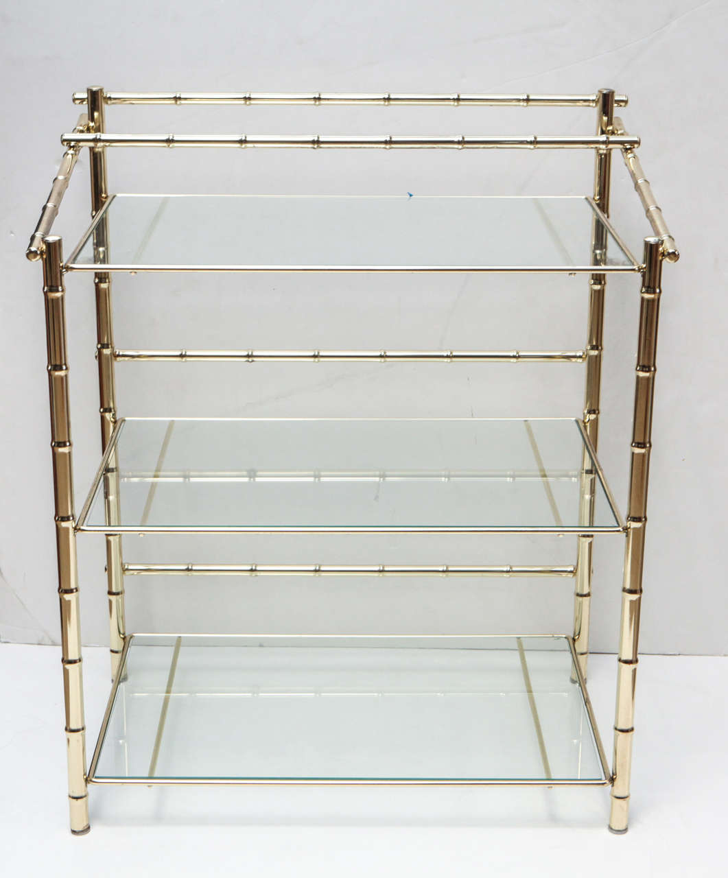 Barcart with faux bamboo brass frame and three tiers of glass