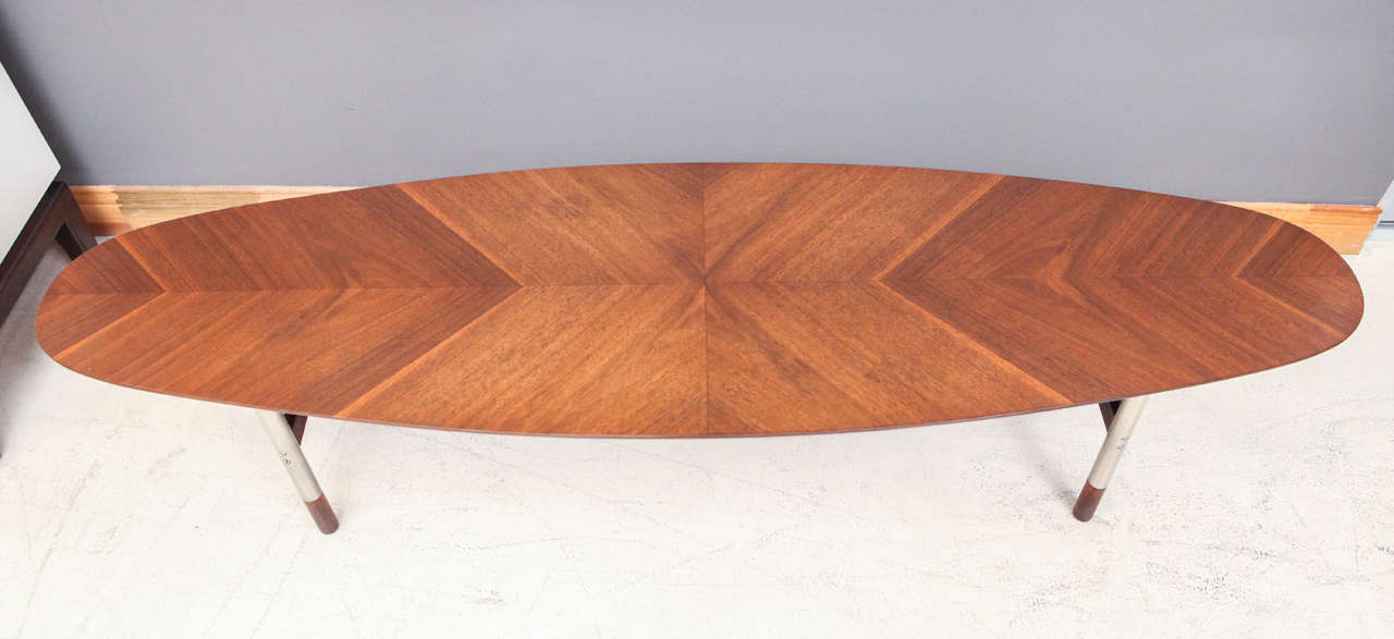 Teak and stainless steel surfboard table by Arne Vodder.