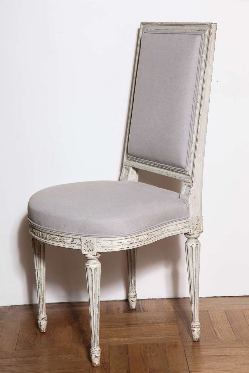 Early 20th Century A Set of Six Carved and Painted Louis XVI Style Dining Chairs. France c. 1920 For Sale