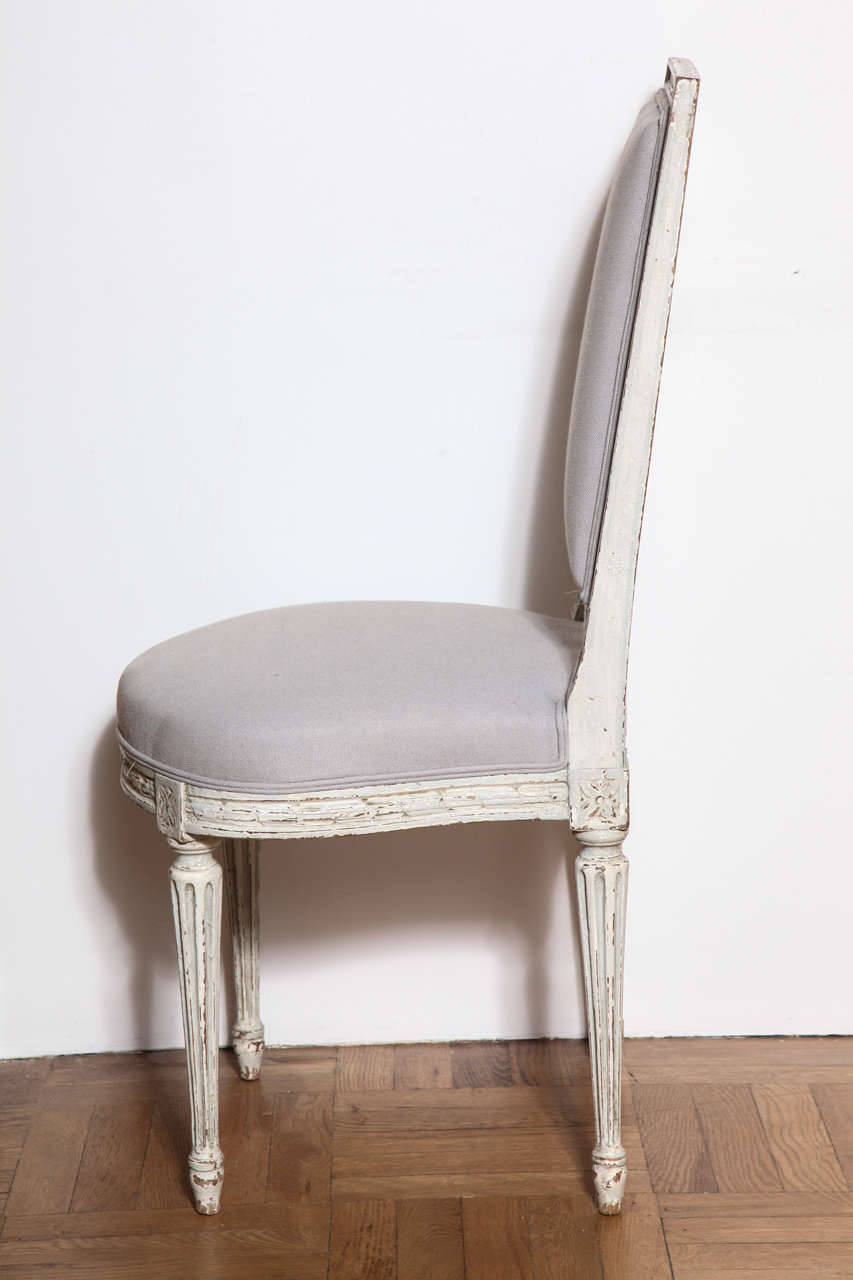 Linen A Set of Six Carved and Painted Louis XVI Style Dining Chairs. France c. 1920 For Sale
