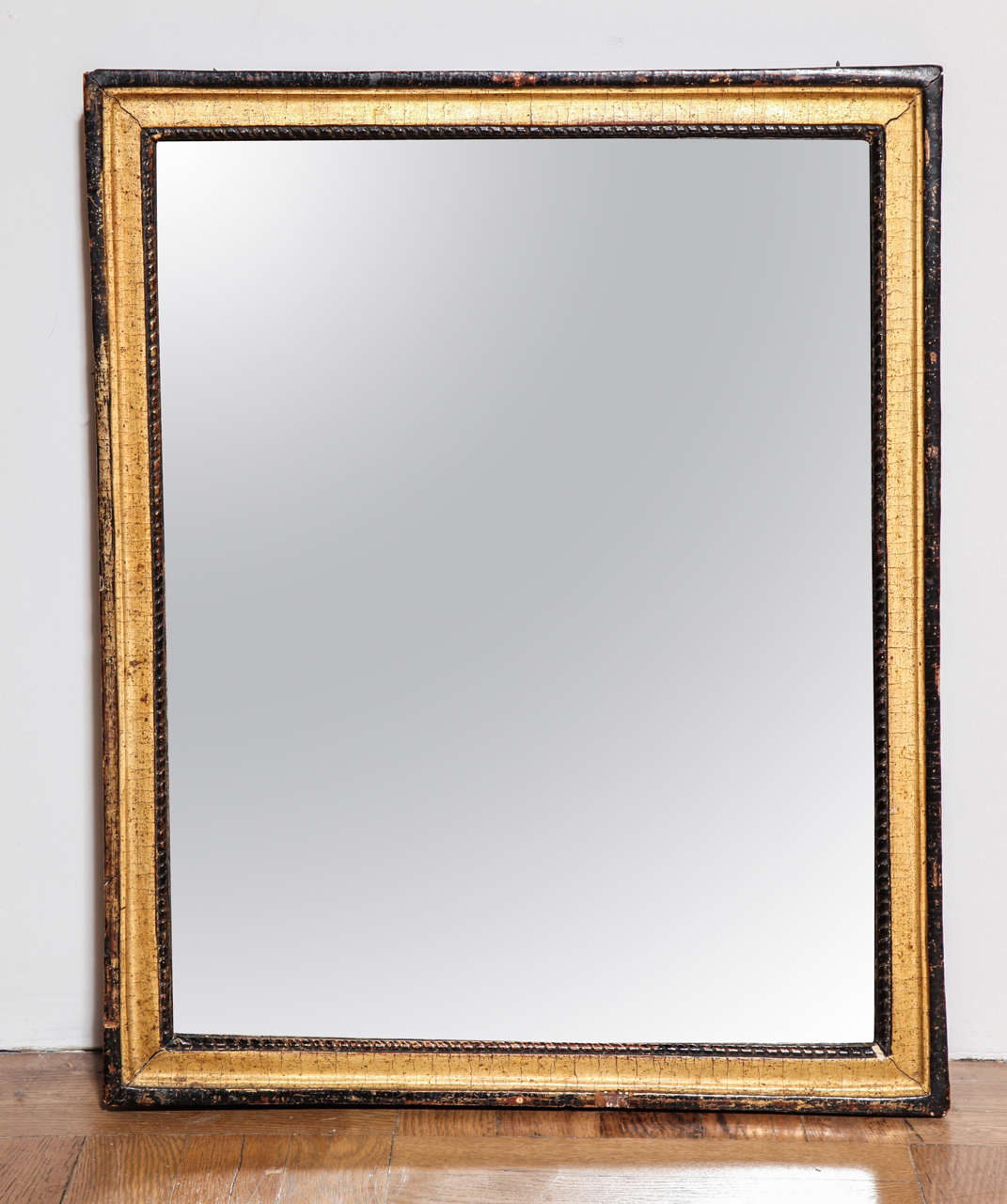 French A Carved and Parcel Gilt Mirror. France c. 1850 For Sale