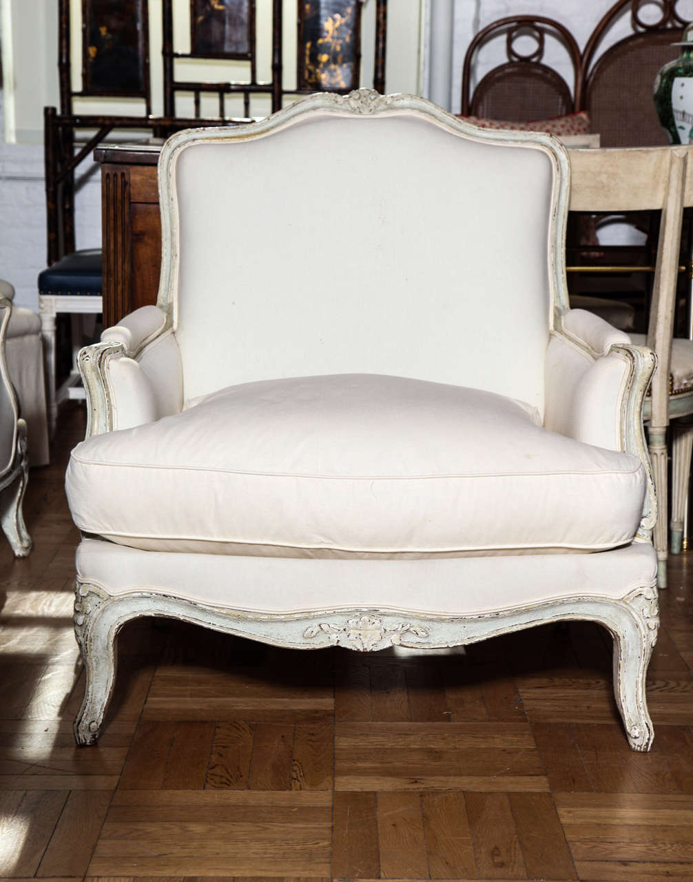 A Pair of Large Carved and Painted Bergeres. France c. 1940