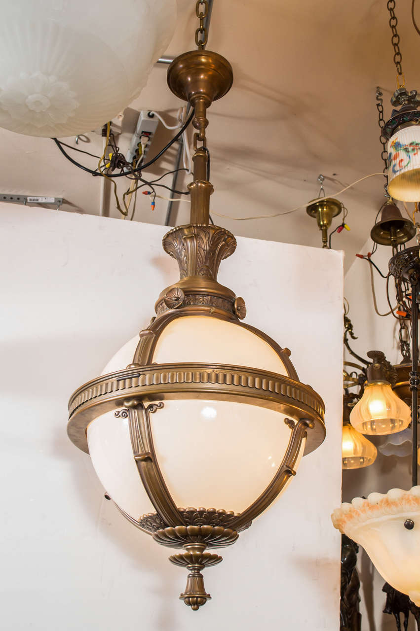 Being lighting dealers for 40 years there is one particular type chandelier we dream of, and this is it. I call this one of the most fabulous piece of antique lighting we have ever offered. This orb just couldn't be anymore beautiful. Handsome