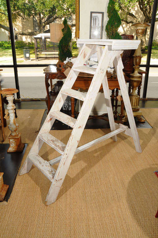 This ladder is a fantastic piece with loads of character. Drips of hand-spattered paint top this sturdy wood frame, creating a perfect resting place for plants, knick knacks, or whatever you have to show off. It would also make a creative