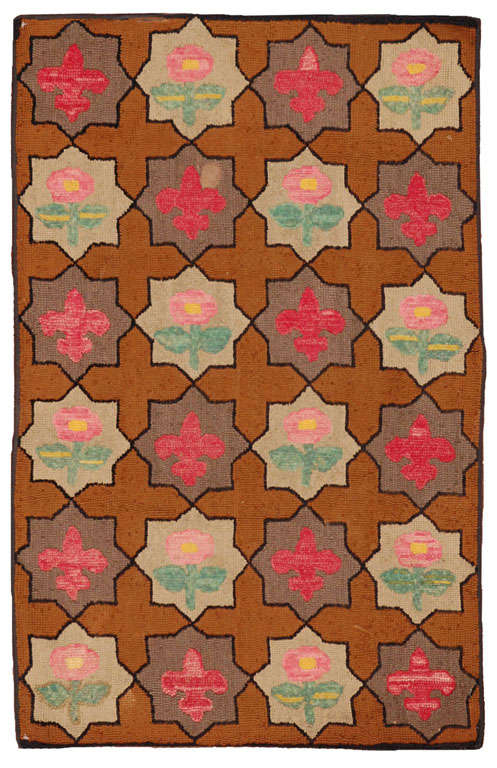 The traditional folk art of rug hooking reached its zenith from about 1850-1920 in the coastal communities of Maine. The craft rapidly spread north through the Maritime provinces of Canada and south to the Cape and Islands of Massachusetts.<br