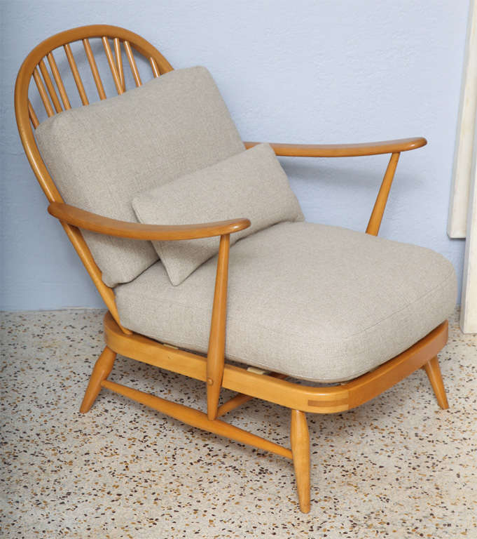 Deep and low to the ground, these Model 203 chairs by British manufacturer, Ercol, are the model of comfortable, beach house chic. We've re-imagined them in rough-hewn linen with slouchy, down-wrapped, custom cushions, designed to highlight their