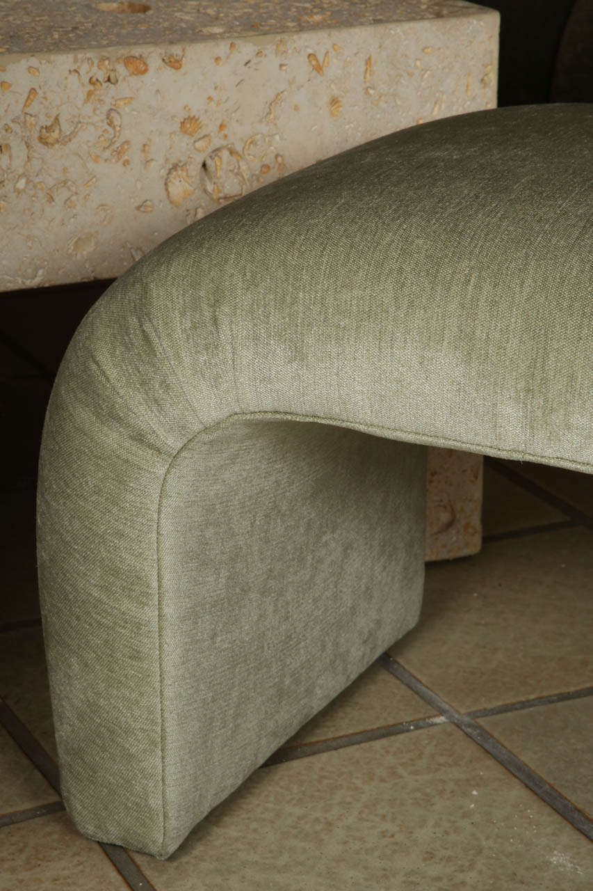 Stylish low bench upholstered in a lovely pale green chenille