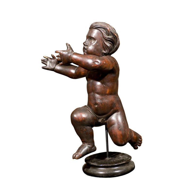 Carved 19th century figural cherub