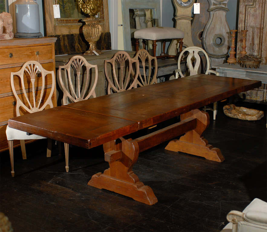 A Beautiful French Trestle Table with 2 removable leaves.
Dimensions are: 110.5