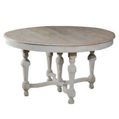 A European Round Painted Wood Table with Cross Stretcher