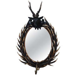 Antique Staghorn Black Forest Oval Mirror
