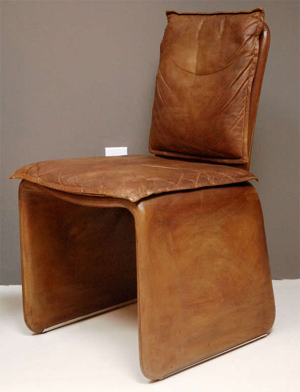 Set of 4 1970's Italian dining chairs in original leather.