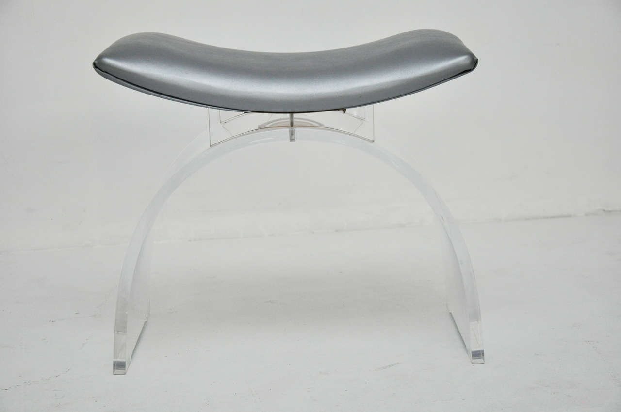 Lucite stool with original metallic grey vinyl seat.