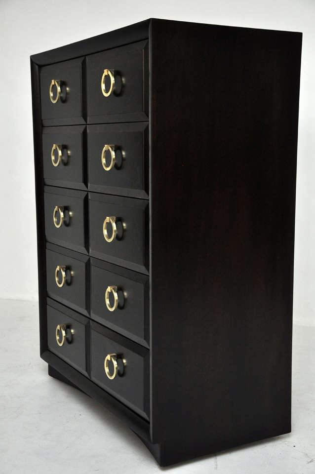 Tall five-drawer dresser by T.H. Robsjohn-Gibbings for Widdicomb. Newly finished in rich espresso tone. Original brass ring pulls. Fully restored.