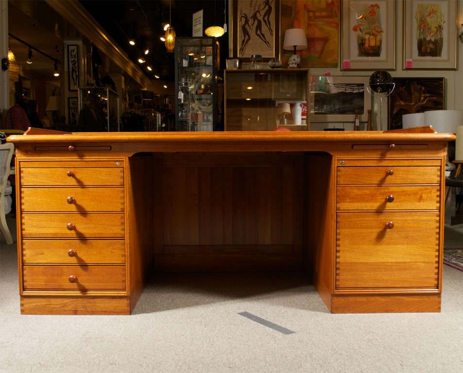 Andreas Hansen for Hadsten Træindustri, an early 1970's partners desk. Desk is Teak with a leather top, nice craftsmanship/detailing has been put into it. You can tell by just looking at it's corner joints. The desk is three parts, two file/drawer