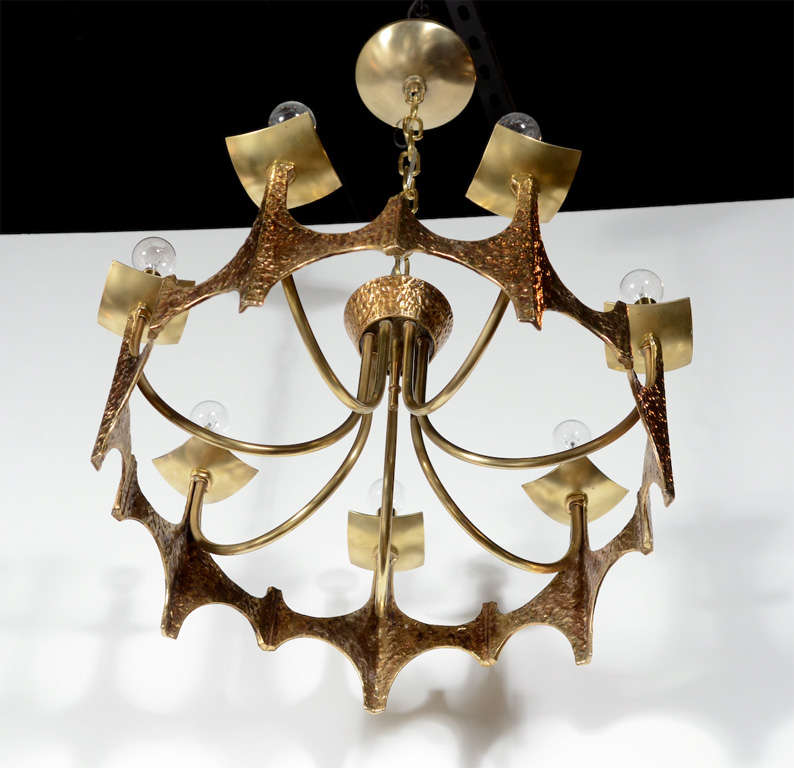 Modernist  sculpted solid brass hand wrought stunning chandelier by Moe Bridges in a Brutalist style newly electrified with 7 lights. Height can be adjusted.