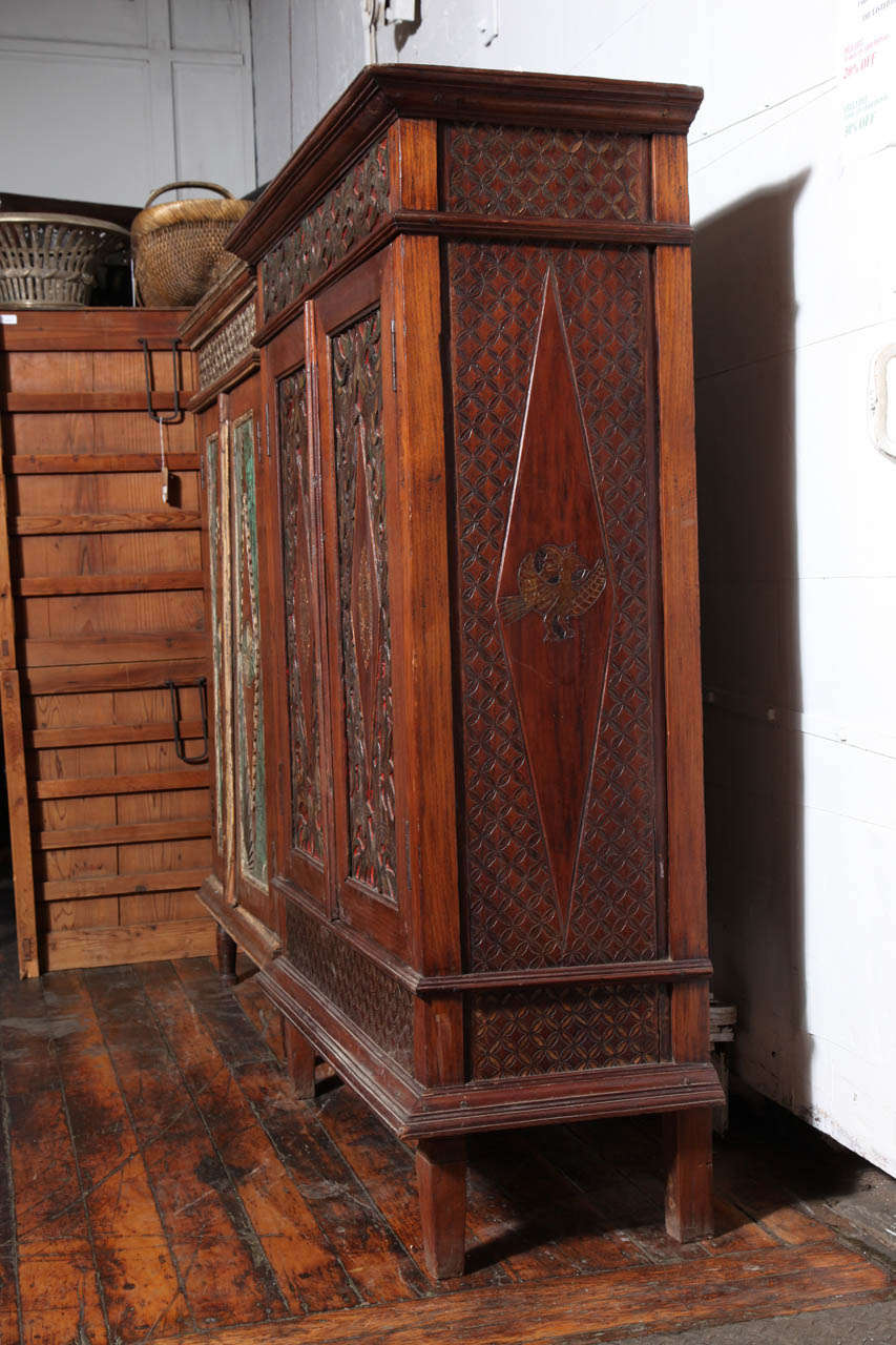 Indonesian Antique Javanese Teakwood Cabinet with Detailed Carvings, Early 20th Century