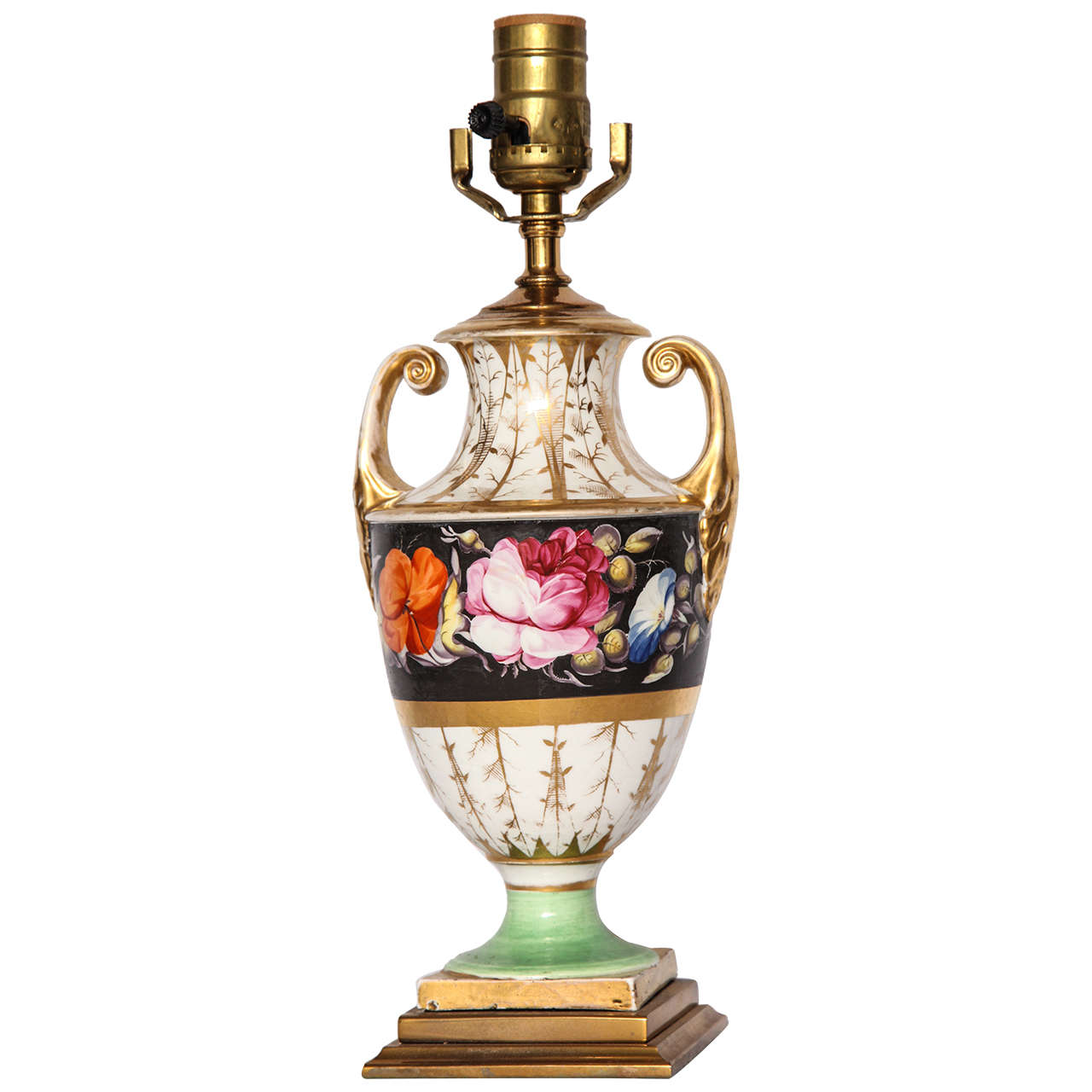 Floral porcelain urn-form lamp. Continental porcelain urn-form lamp with hand-painted flowers and gilt decorations on heavy gilt bronze base. Europe, mid 1800's
Dimension: 6.5