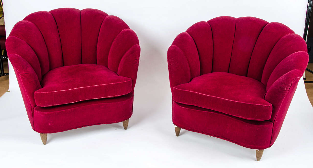 1940's italian pair of round back armchairs in the style of Guglielmo Ulrich.Covered in dark red velvet in original condition