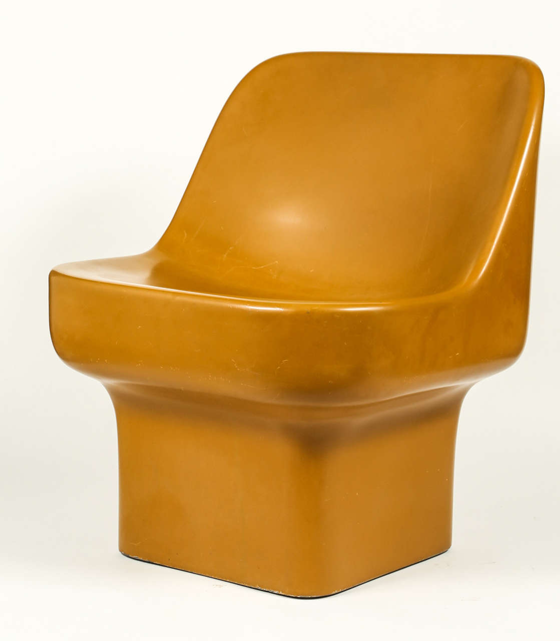 Lounge chairs by Douglas Deeds for Architectural Fiberglass in mustard glaze, circa 1975.