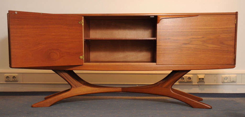 Very rare 1960's sideboard by the Scottish top-lever manufacturer Beithcraft. Superb quality of flaming teak wood and and wonderful organic design. The sideboard is in a spotless condition.