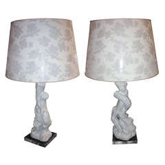 A pair of whimsical stuccoed lamps